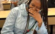 ​​​​​​​UB Tutor Counselor Dominique just cannot contain her laughter.